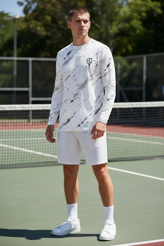 BREAKPOINT Splatter Strike White Long Sleeve Performance Tee — white long sleeve tennis shirt with black splatter print