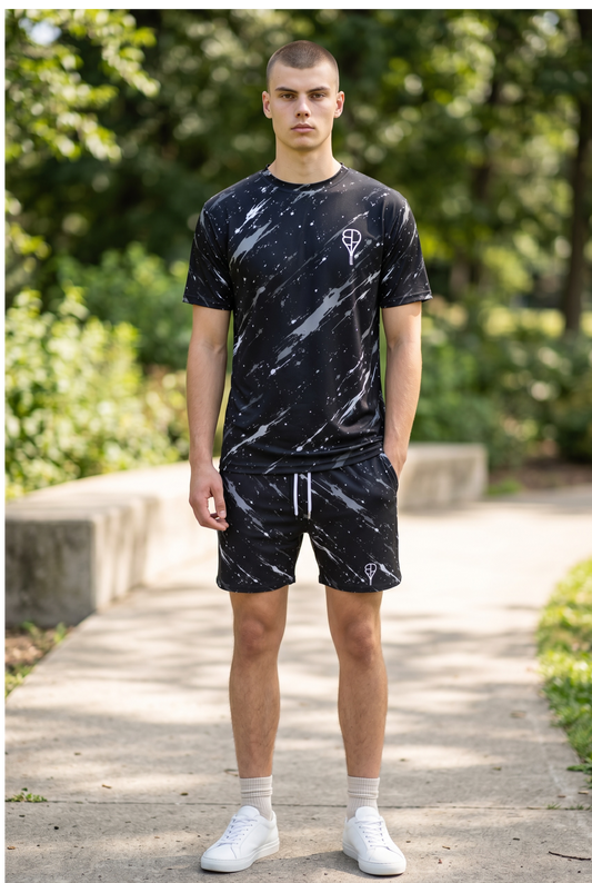 BREAKPOINT Splatter Strike Black Performance Tee and matching black tennis shorts with white splatter print
