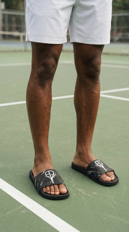 BREAKPOINT slides with white straps and black splatter print