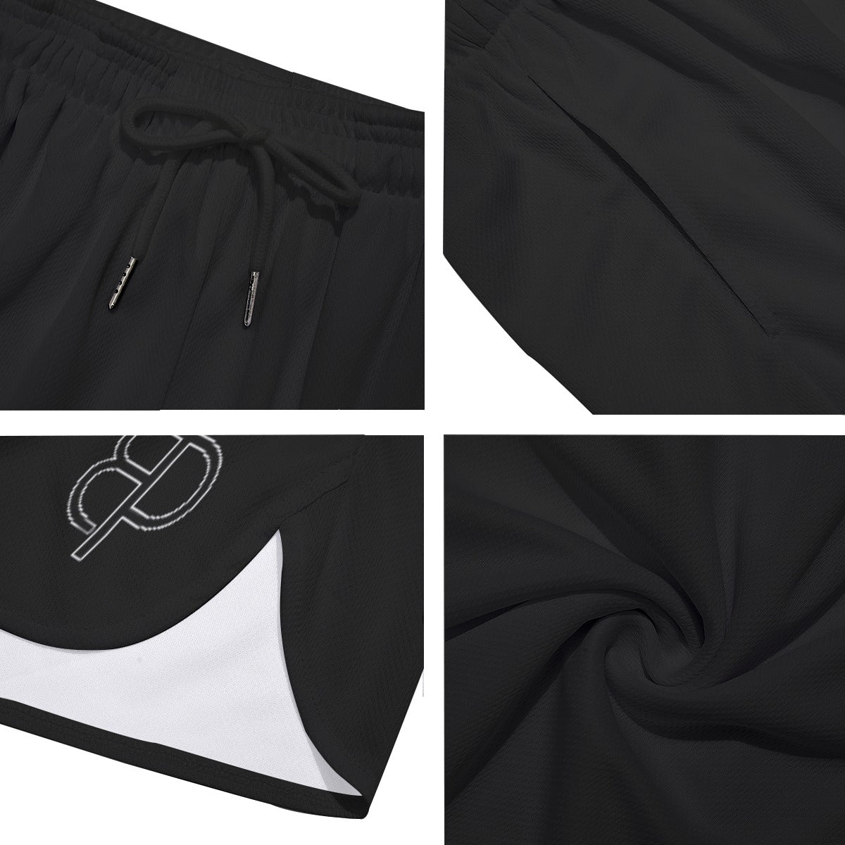 BREAKPOINT Sportswear black athletic shorts featuring a drawstring waist, side-split hem, and lightweight fabric.