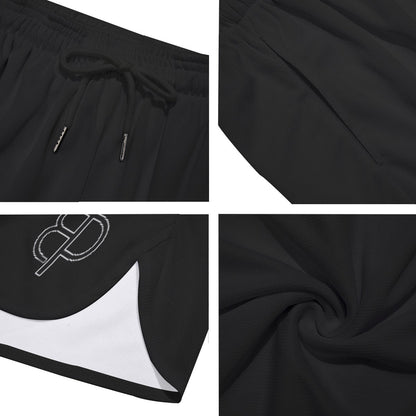 BREAKPOINT Sportswear black athletic shorts featuring a drawstring waist, side-split hem, and lightweight fabric.