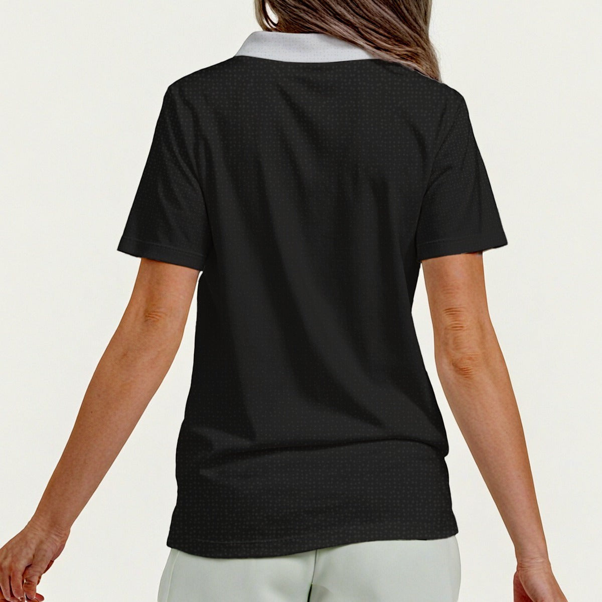 Back view of a BREAKPOINT Sportswear women's black lightweight polyester zip polo shirt with a white collar.