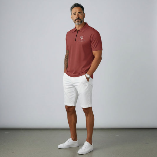BREAKPOINT Sportswear crimson red quarter-zip performance polo shirt with a classic collar worn with white shorts.