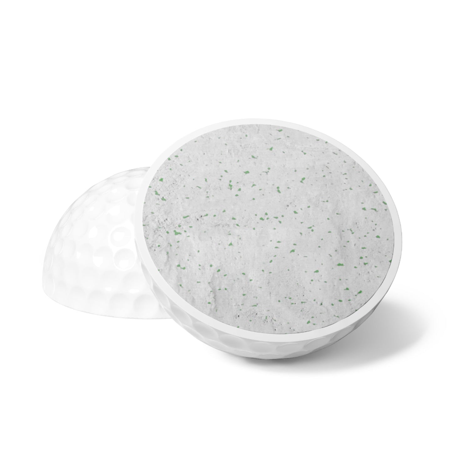 BREAKPOINT Sportswear golf ball cross-section showing durable rubber core and white Surlyn cover construction.