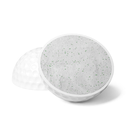 BREAKPOINT Sportswear golf ball cross-section showing durable rubber core and white Surlyn cover construction.