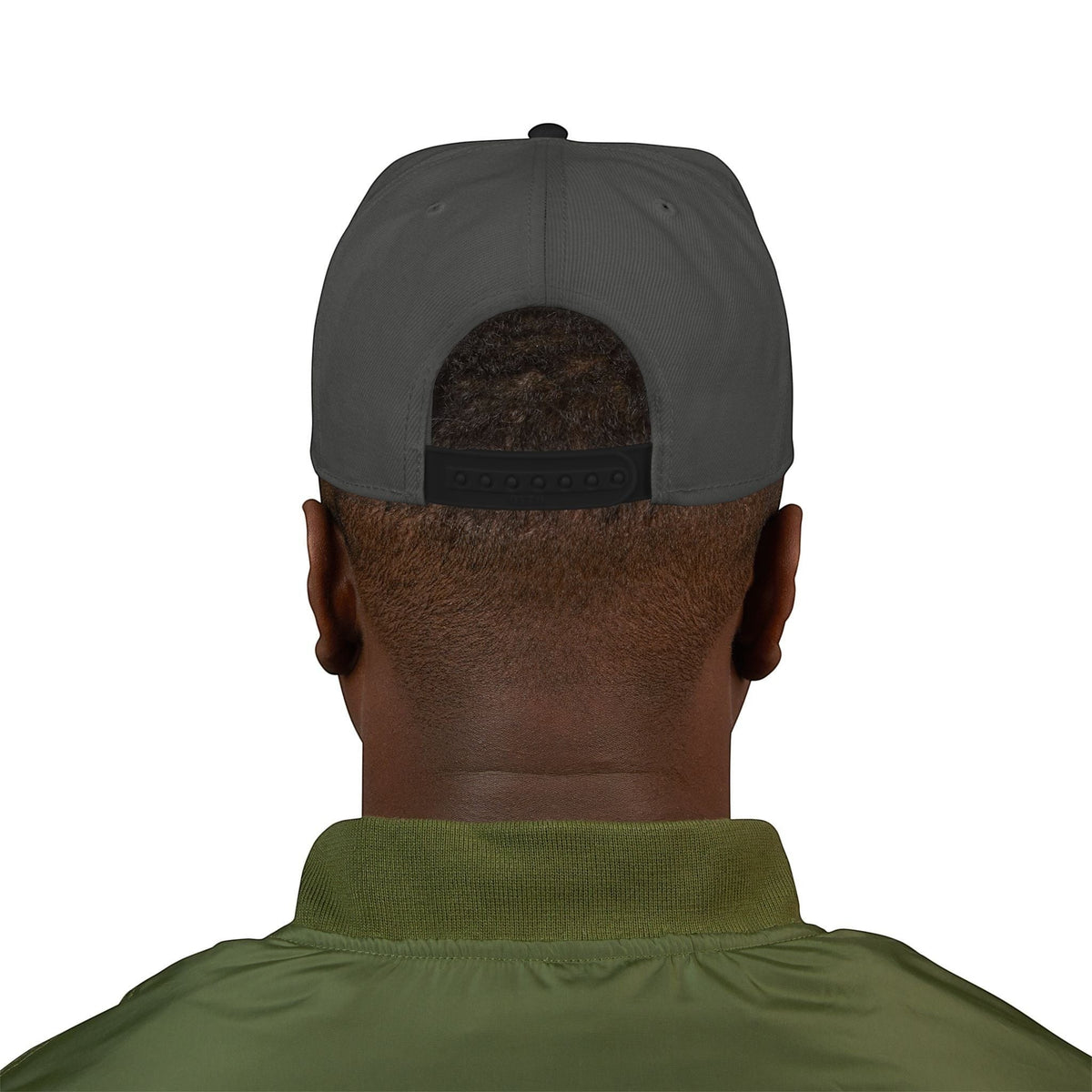 A man wearing a grey BREAKPOINT Sportswear high-profile snapback cap with a flat visor and white logo embroidery.