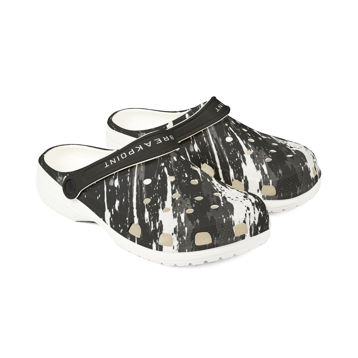 BREAKPOINT Sportswear Splatter Shock EVA foam clogs in black and white with a pivoting heel strap.