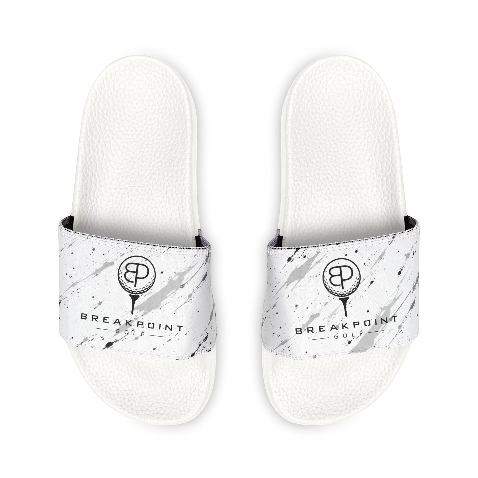 BREAKPOINT Sportswear white golf slides with removable straps featuring a black and grey paint splatter logo design