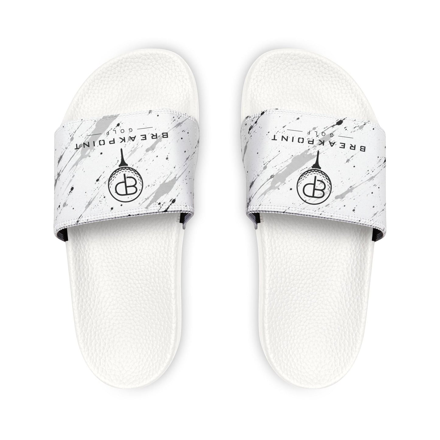 BREAKPOINT Sportswear white golf slides with removable straps featuring a black paint splatter design and logo