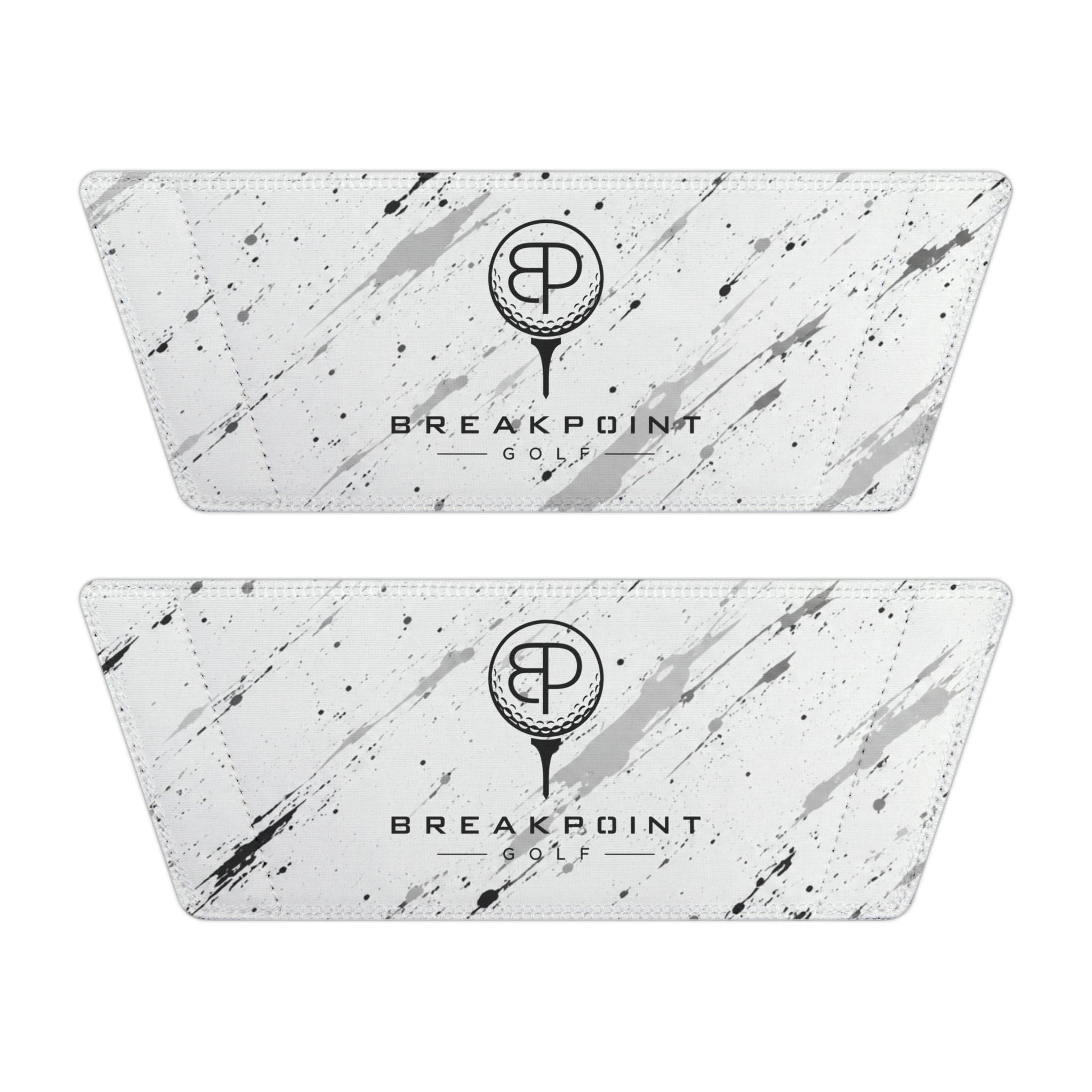 BREAKPOINT Sportswear white golf slide straps with black paint splatter pattern and BREAKPOINT Golf logo