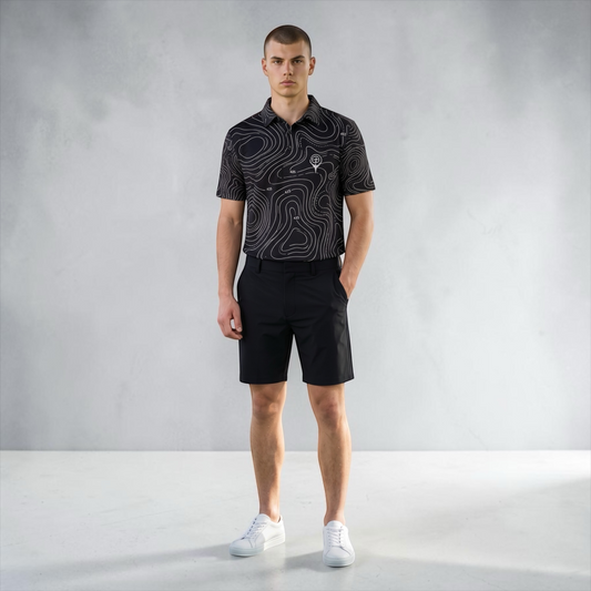 BREAKPOINT Breakline Black Performance Polo with signature contour line pattern — main product view